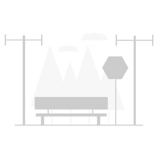 bus stop chair light posts trees clouds